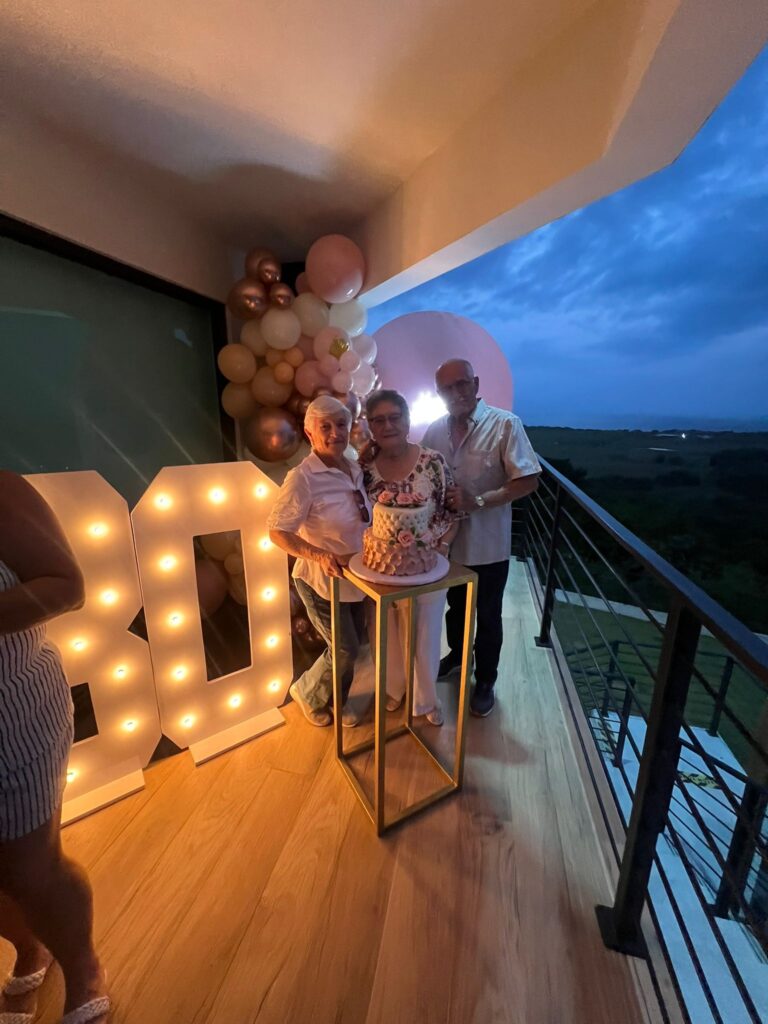 Birthday celebration with illuminated decorations on the balcony at Blue Malibu PR
