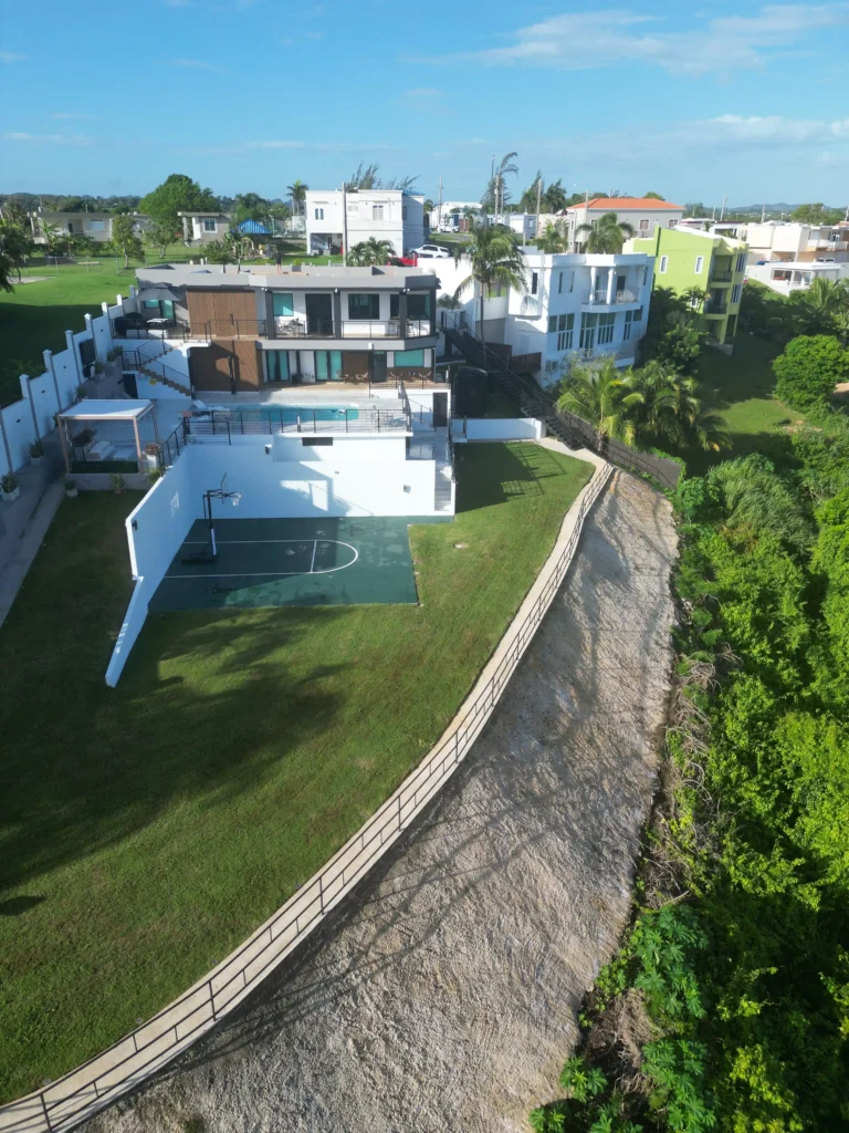 Aerial view of Blue Malibu PR private villa with swimming pool and landscaped grounds