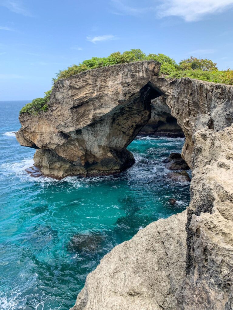 Natural coastal rock formations and turquoise waters on Puerto Rico north coast